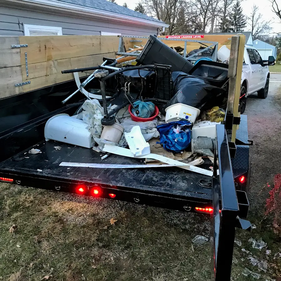 Roll-off dumpster delivered to a residential driveway in Lake City