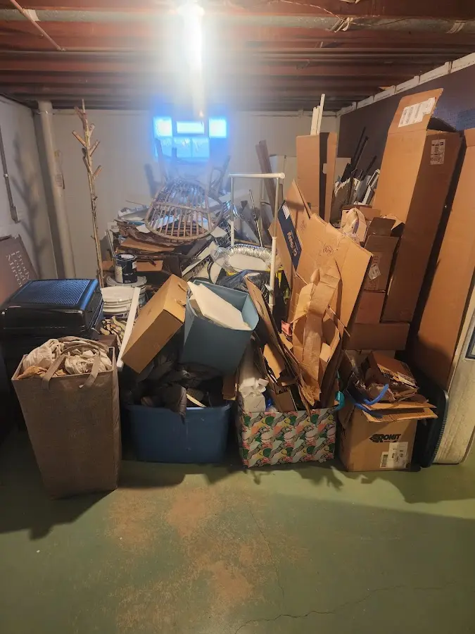 Roll-off dumpster container at job site for Roll Off Dumpster Rental in Lake City